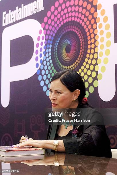 Author Diana Gabaldon signs books during Entertainment Weekly's PopFest at The Reef on October 30, 2016 in Los Angeles, California.