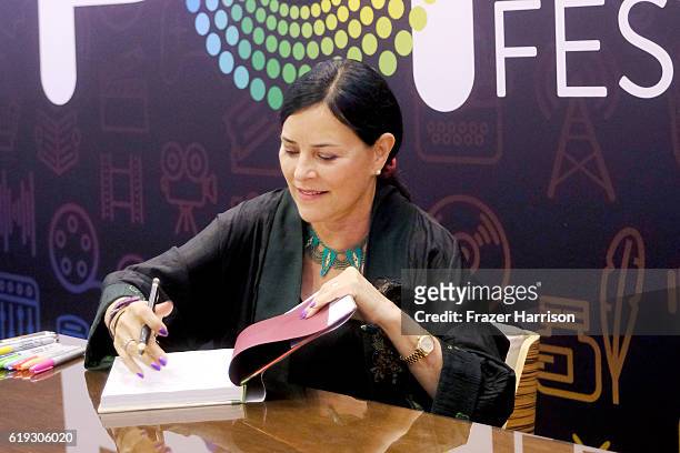 Author Diana Gabaldon signs books during Entertainment Weekly's PopFest at The Reef on October 30, 2016 in Los Angeles, California.
