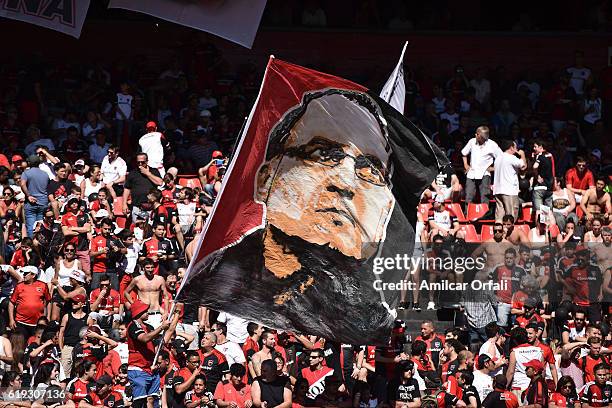 Fans of Newell's Old Boys cheer for their team during a match between Newell's Old Boys and San Lorenzo as part of Torneo Primera Division 2016/17 at...