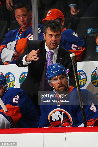 Head coach Jack Capuano of the New York Islanders looks on from the bench against the Toronto Maple Leafs at the Barclays Center on October 30, 2016...