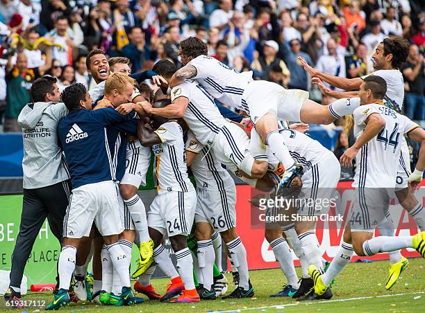 Giovani dos Santos of Los Angeles Galaxy celebrates his game winning goal during Los Angeles Galaxy's MLS Playoff Semifinal match against Colorado...