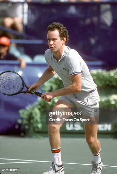 John McEnroe of the United States in action during a match in the Men's 1985 US Open Tennis Championships circa 1985 at the National Tennis Center in...