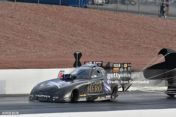 Chutes are deployed on the Jack Beckman Don Schumacher Racing Dodge Charger NHRA Funny Car during the second round of qualifying for the 16th Annual...