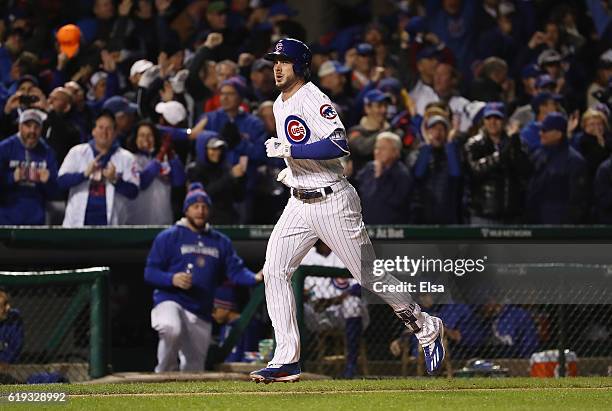 Kris Bryant of the Chicago Cubs rounds the bases after hitting a home run in the fourth inning against the Cleveland Indians in Game Five of the 2016...