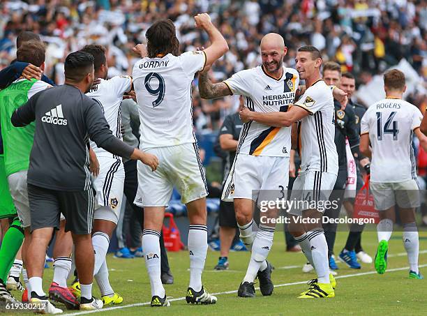 Jelle Van Damme of Los Angeles Galaxy celebrates with teammates on the goal by Giovani dos Santos during the second half of leg one of the Audi 2016...