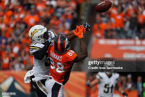 Pass intended for Denver Broncos wide receiver Demaryius Thomas is broken up by San Diego Chargers free safety Adrian Phillips during a game between...