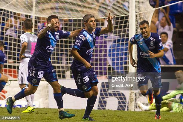 Alvaro Navarro of Puebla, celebrates his goal against Leon during their Mexican Apertura 2016 Tournament football match at the Cuauhtemoc stadium on...