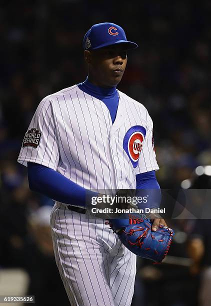Aroldis Chapman of the Chicago Cubs walks off the field after pitching in the seventh inning against the Cleveland Indians in Game Five of the 2016...