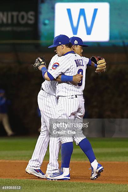 Addison Russell and Javier Baez of the Chicago Cubs celebrate after beating the Cleveland Indians 3-2 in Game Five of the 2016 World Series at...