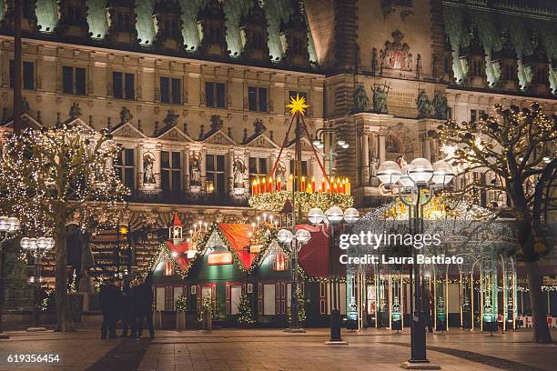 christmas market night fairy ambiance in front of the hamburg rathaus markt - bavaria traditional stock pictures, royalty-free photos & images