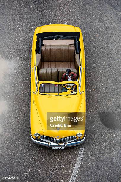 vintage american car driving in havana, cuba - mercury transit stock pictures, royalty-free photos & images