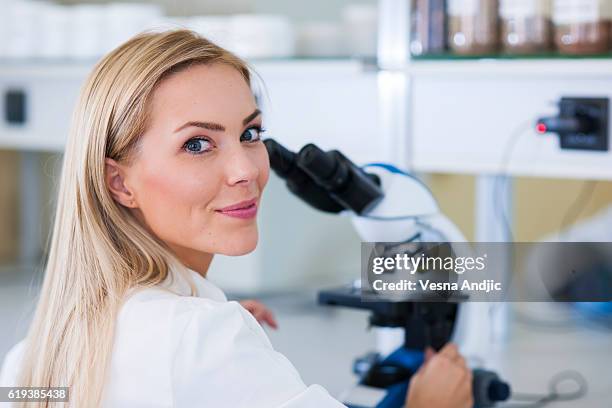 2,316 Blonde Woman Lab Stock Photos, High-Res Pictures, and Images ...