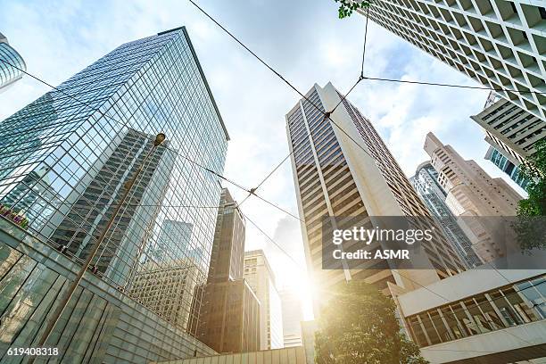 office buildings in hong kong - hong kong sunrise stock pictures, royalty-free photos & images
