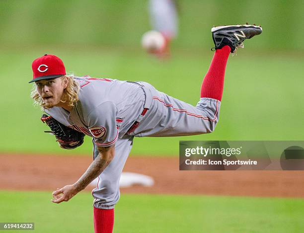 Cincinnati Reds starting pitcher John Lamb delivers the pitch against the Houston Astros during a MLB baseball game, Friday, June 17 in Houston....