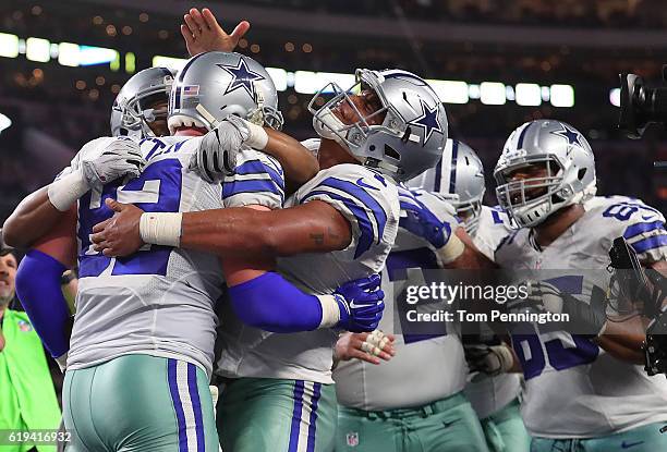 Jason Witten of the Dallas Cowboys celebrates with Dak Prescott of the Dallas Cowboys after scoring the game winning touchdown against the...