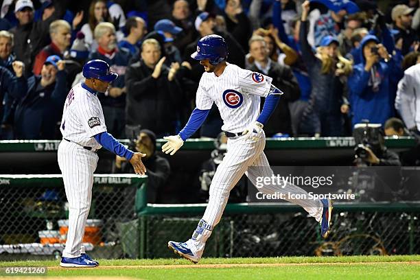 Chicago Cubs third baseman Kris Bryant celebrates his home run during the fourth inning of the 2016 World Series Game 5 between the Cleveland Indians...