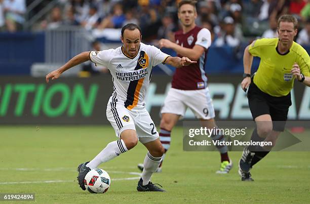 Landon Donovan of Los Angeles Galaxy turns to dribble the ball and starts the attack from midfield during leg one of the Audi 2016 MLS Cup Playoff...