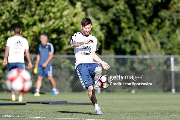 Argentina forward Lionel Messi plays a pass in warm up. Argentina practiced in advance of their quarterfinal match against Venezuela in the 2016 Copa...
