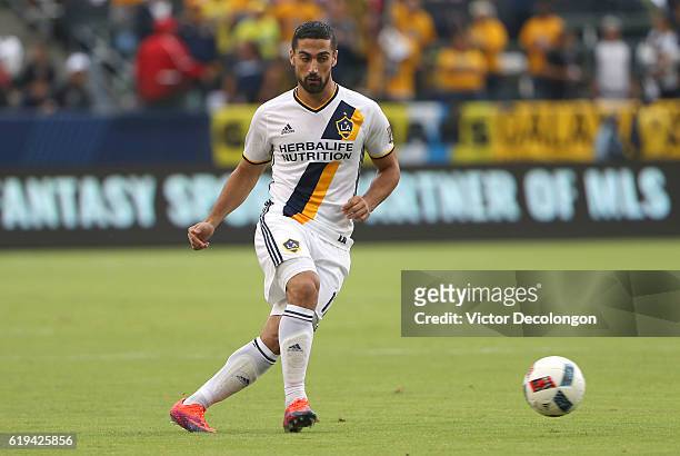 Sebastian Lletget of Los Angeles Galaxy passes the ball during leg one of the Audi 2016 MLS Cup Playoff Western Conference Semfinal between the...
