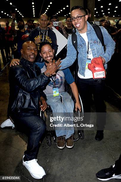 Boxer Mike Tyson poses with fans at day 3 of Stan Lee's Los Angeles Comic Con 2016 held at Los Angeles Convention Center on October 30, 2016 in Los...