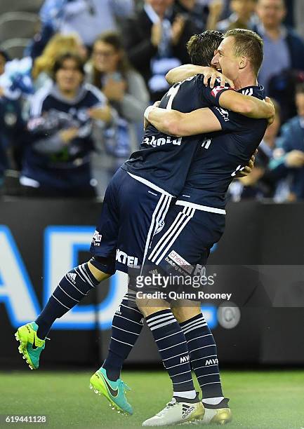 Marco Rojas and Besart Berisha of the Victory celebrate a goal during the round four A-League match between the Melbourne Victory and Wellington...