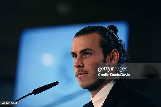 Gareth Bale of Real Madrid holds a press conference at the Santiago Bernabeu stadium after extending his contract with Real until 2022 on October 31,...