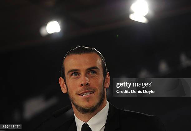 Gareth Bale of Real Madrid holds a press conference at the Santiago Bernabeu stadium after extending his contract with Real until 2022 on October 31,...