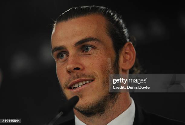 Gareth Bale of Real Madrid holds a press conference at the Santiago Bernabeu stadium after extending his contract with Real until 2022 on October 31,...