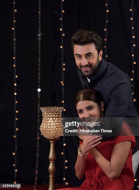 Bollywood actress Anushka Sharma and actor Ranbir Kapoor pose for the Diwali photo shoot on October 25, 2016 in Mumbai, India.