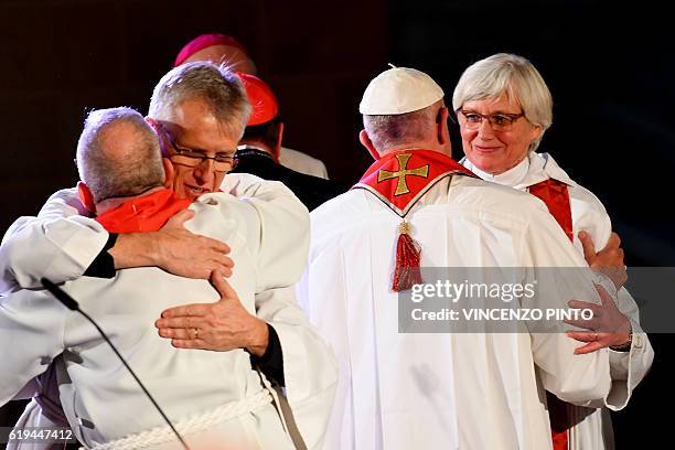Pope Francis greets Swedish bishop Antje Jackelen during an ecumenical prayer at the Lund Cathedral on October 31, 2016 in Lund, Sweden. Francis...