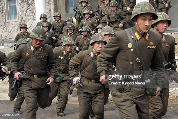 North Korea - Troops engage in a military exercise that was shown to Kyodo News by the Korean People's Army near Pyongyang on March 6 a day after...