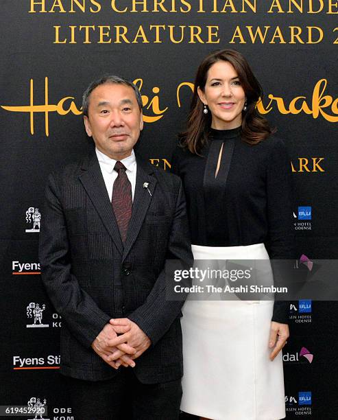 Japanese author Haruki Murakami poses with Danish Crown Princess Mary after receiving Hans Christian Andersen Literature Award 2016 at the Odense...