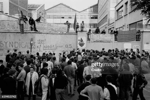 Students union UNEF gather in front of Citroen car factory, quai de Javel in support of workers during the May 1968 general strike on June 2, 1968 in...