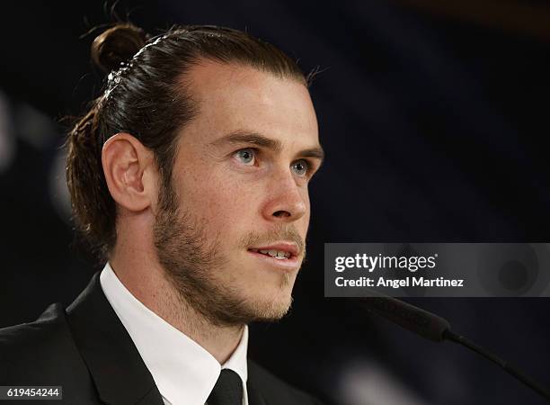 Gareth Bale of Real Madrid attends a press conference after signing his contract extension with the club until 2022 at Estadio Santiago Bernabeu on...