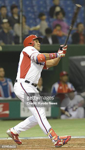 Japan - Frederich Cepeda of Cuba hits a two-run home run to open the scoring in the first inning of a World Baseball Classic second-round game...