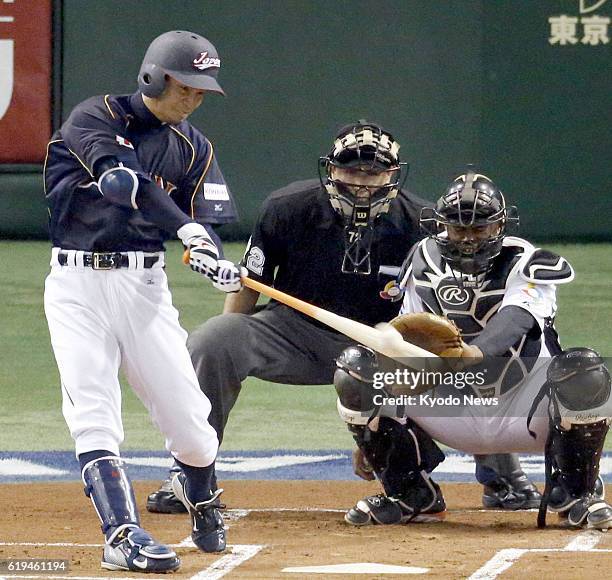 Japan - Takashi Toritani of Japan hits a home run to open the scoring in the first inning of a World Baseball Classic second-round game against the...