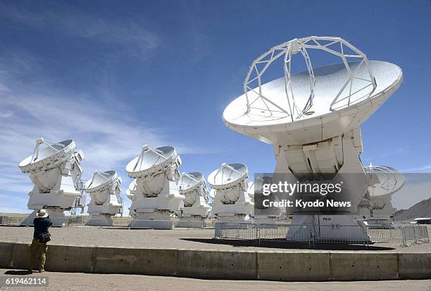 Chile - Reporters are shown the parabolic antennas of the Alma radio telescope on an Andean plateau in northern Chile on March 12 ahead of the...