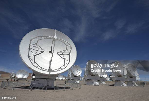 Chile - Reporters are shown the parabolic antennas of the Alma radio telescope on an Andean plateau in northern Chile on March 12 ahead of the...