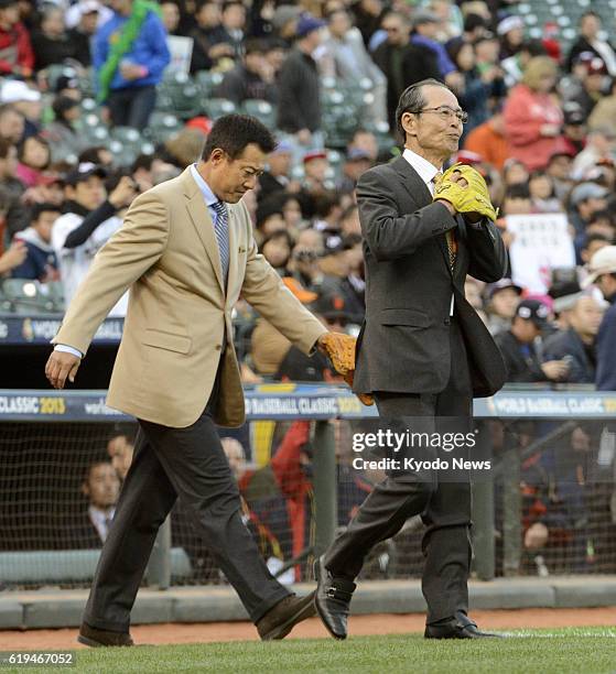 United States - Sadaharu Oh , Softbank Hawks chairman, and Tatsunori Hara, manager of the Yomiuri Giants, prepare to throw out the ceremonial first...