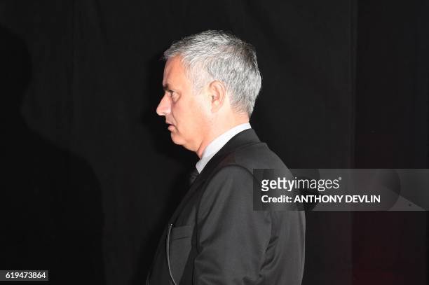 Manchester United's Portuguese manager Jose Mourinho arrives to attend the "United for UNICEF Gala Dinner" at Old Trafford in Manchester, north-west...