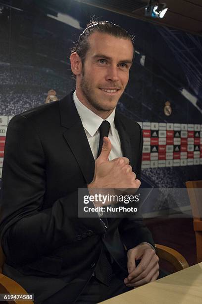 Gareth Bale of Real Madrid holds a press conference at the Santiago Bernabeu stadium after extending his contract with Real until 2022 on October 31,...