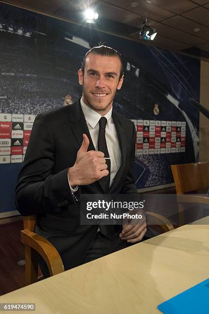 Gareth Bale of Real Madrid holds a press conference at the Santiago Bernabeu stadium after extending his contract with Real until 2022 on October 31,...