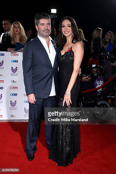 Simon Cowell and Lauren Silverman attend the Pride Of Britain Awards at The Grosvenor House Hotel on October 31, 2016 in London, England.
