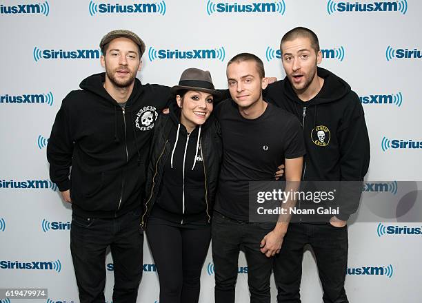 Kevin Bivona, Aimee Allen, Justin Bivona and Jesse Bivona of The Interrupters visit the SiriusXM Studio on October 31, 2016 in New York City.