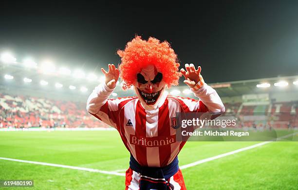 Fan parades in a Halloween fancy dress costume prior to the Premier League match between Stoke City and Swansea City at Bet365 Stadium on October 31,...