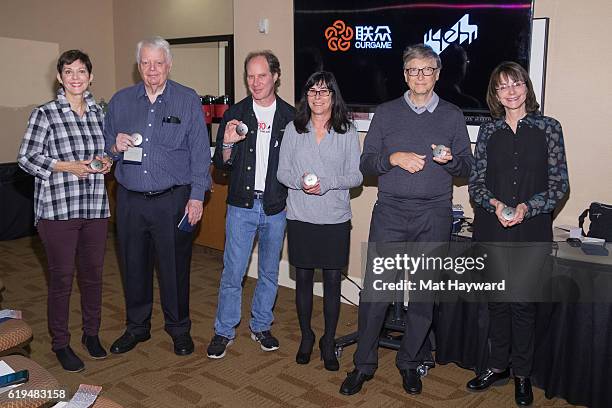 Bridge Players Jill Meyers, Bob Hamman, Fred Gitelman, Sheri Winestock, Bill Gates and Sharon Osberg pose for a photo before playing the first live...