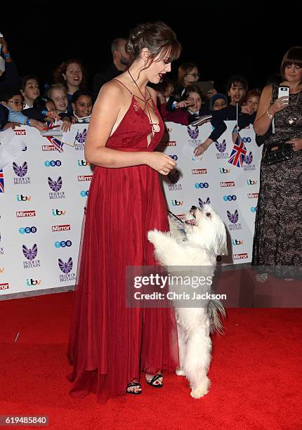 Ashleigh Butler and Pudsey attends the Pride Of Britain awards at the Grosvenor House Hotel on October 31, 2016 in London, England.