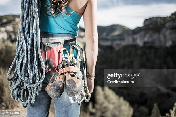 woman rock climber with equipment - mountain climbing equipment stock pictures, royalty-free photos & images