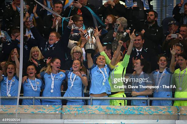 Steph Houghton of Manchester City Women lift the trophy during the WSL 1 match between Manchester City Women and Birmingham City Ladies at the...