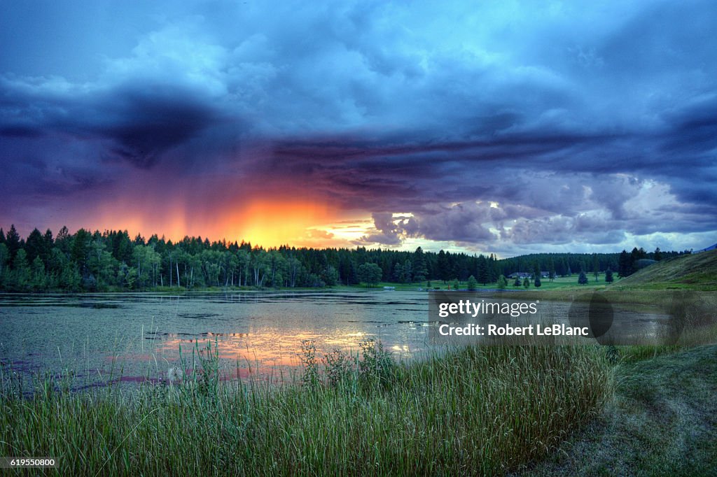 Sunset While Raining Sunset And Rain Clouds High-Res Stock Photo - Getty Images